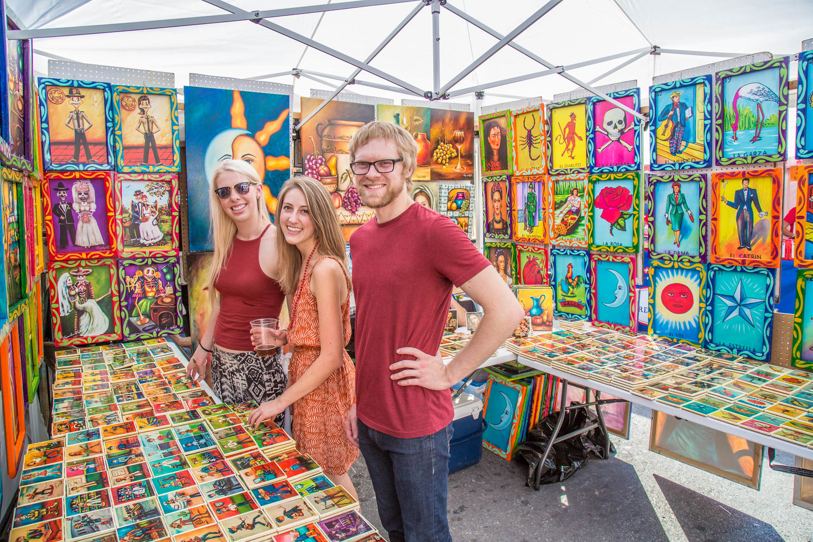 Artist's booths and vendors line the street at Austin's Pecan Street Festival.