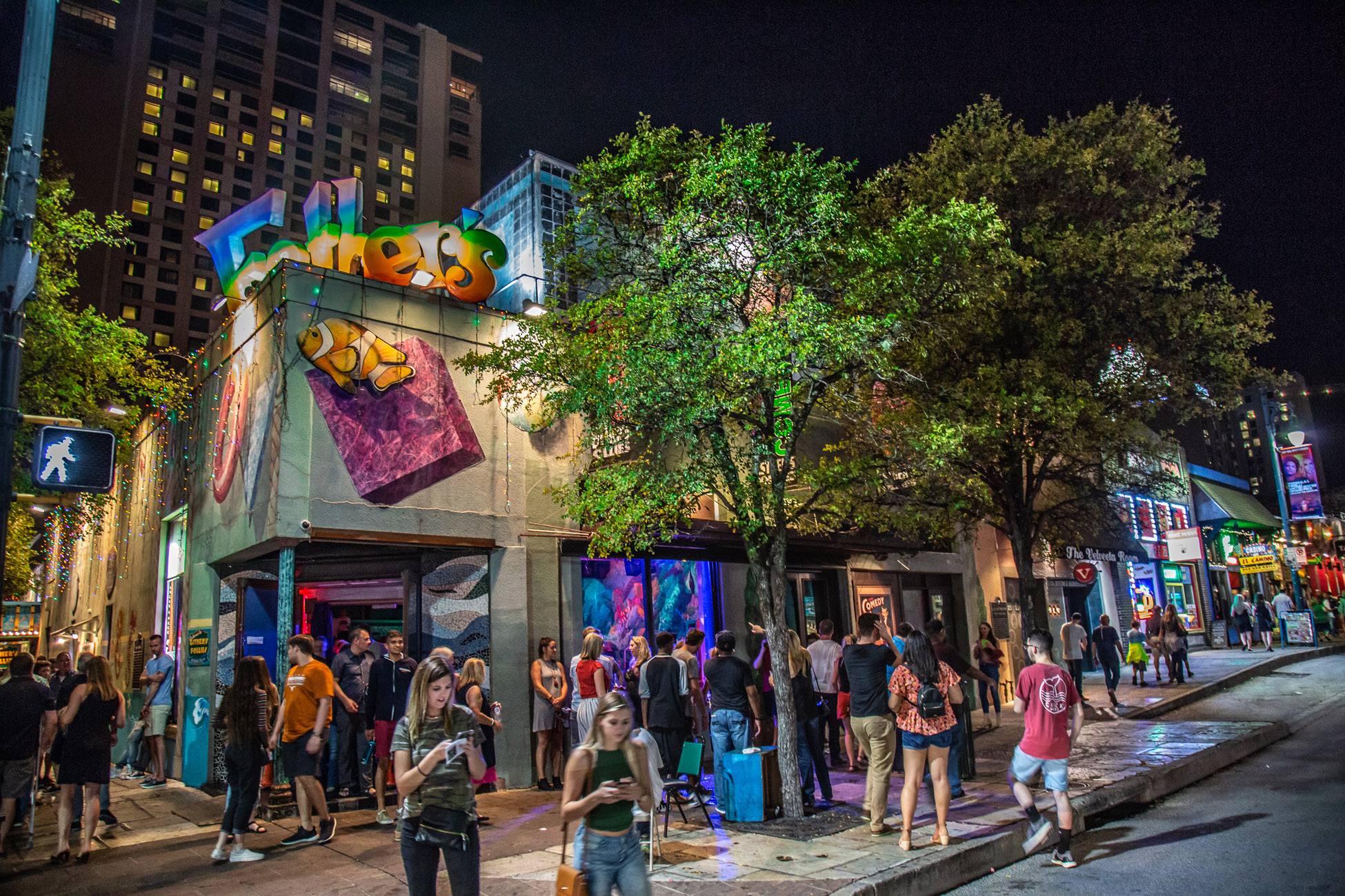 Patrons spill out after a show at the legendary Esther's Follies on 6th Street Austin, TX.  Photo: Will Taylor